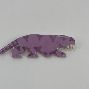 Vintage purple ceramic sabertooth tiger pin